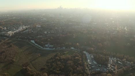 Slider-drone-shot-of-Lea-river-valley-and-central-London-skyline