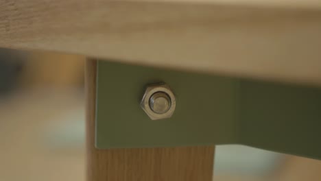 Handmade-oak-caps-ready-to-install-over-bolts-on-bespoke-white-oak-table