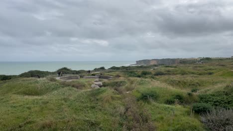 Tourists-visiting-the-Bunkers-at-Normandie-Landing-Beaches-at-The-Pointe-Du-Hoc