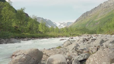Scenic-View-Of-River-And-Mountains-In-Lyngsdalen,-Norway---wide-shot