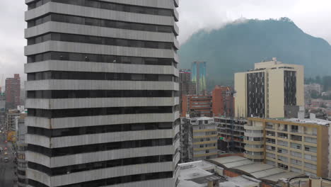 High-rise-Building-In-Downtown-Bogota-With-Misty-Mountain-In-Background-In-Colombia