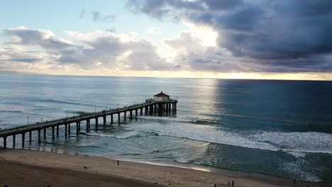 Drone-shot-flying-over-Manhattan-Beach-Pier-on-the-West-Coast-of-America