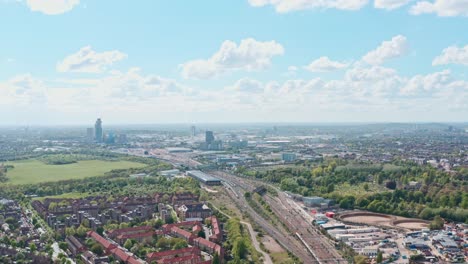 Slow-drone-shot-over-railway-running-through-Kensal-Willesden-and-north-acton