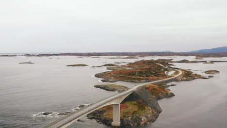 Aerial-view-of-Storseisundet-Bridge-surrounded-by-sea-and-islets,-Atlantic-Road,-More-og-Romsdal-county,-Norway,-Scandinavia,-Europe---drone-shot
