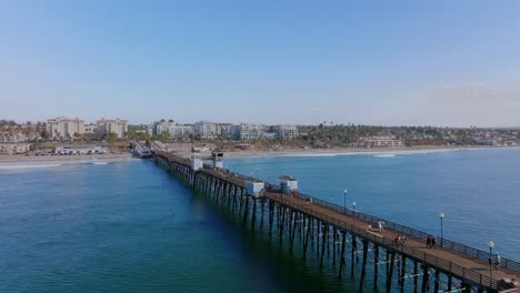 iconic-and-old-Oceanside-wooden-pier-at-Southern-California-coastline,-USA