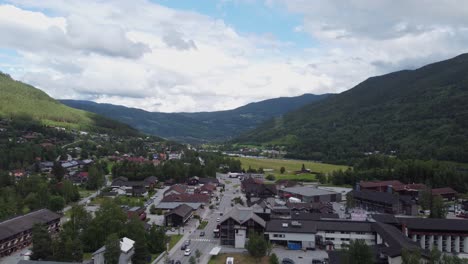 Highway-through-Gol-town-center-in-sunny-summer-afternoon---Aerial-view
