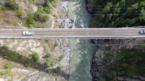 4k-cinematic-aerial-footage-of-high-canyon-bridge-in-northern-Canada-on-a-sunny-day