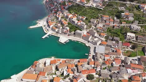 Bird's-Eye-View-On-The-Town-Pucisca-In-Croatia,-Island-Brac,-Europe---drone-shot