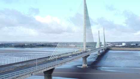 Mersey-gateway-landmark-aerial-view-above-toll-suspension-bridge-river-crossing-orbit-left-to-close-up