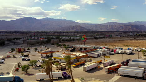 Love's-Travel-Stop-and-truck-stop-near-interstate-10-in-Coachella,-drone-shot-4k