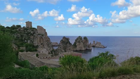 Beautiful-4k-footage-of-stacks-or-Faraglioni-of-Scopello-in-background,-Sicily