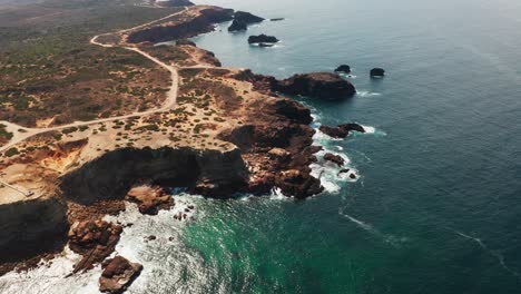 Drone-shot-of-the-Rocky-Cliffs-along-the-Coast-of-Portugal