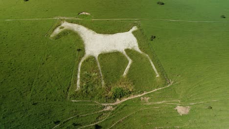 Alton-Barnes-iconic-white-horse-hill-carving-chalk-figure-landmark-aerial-orbit-left-view
