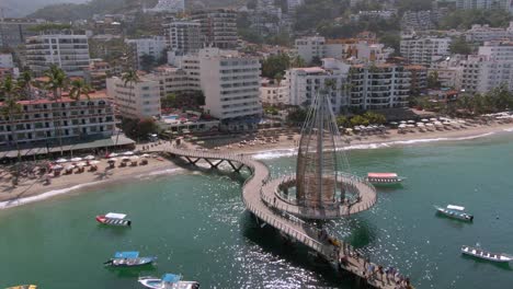 Los-Muertos-Pier-At-Daytime---Puerto-Vallarta,-Jalisco,-Mexico---aerial-drone-shot