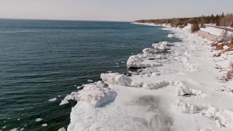 Frozen-Waters-Of-Lake-Superior-In-Minnesota-Coast---aerial-shot
