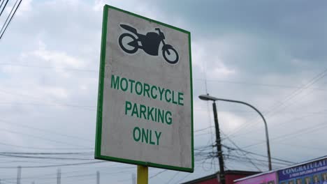 Motorcycle-parking-only-signage-alongside-the-street