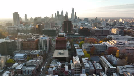 Cinematic-truck-shot-of-Philly-skyline-and-residential-housing-establishing-shot