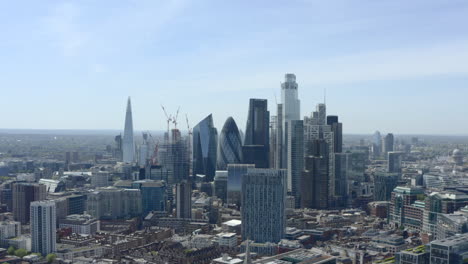 Dolly-forward-drone-shot-towards-City-of-London-skyscrapers