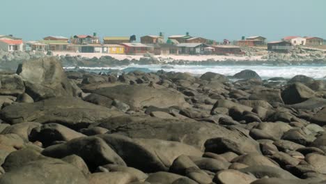 Scenery-From-Rocky-Beach-With-Beachfront-Houses-In-Atacama,-Chile-At-Summer