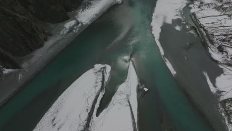 Aerial-Overhead-Shot-Of-Hussaini-Suspension-Bridge-Over-Winter-Hunza-River