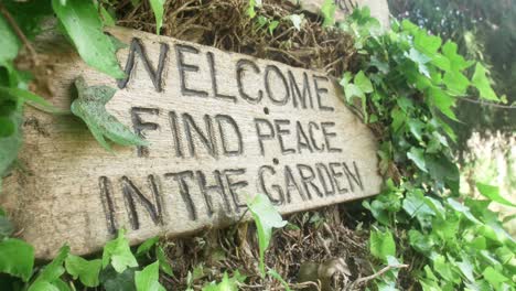 Welcome-find-peace-in-the-garden-sign-at-entrance-to-relaxing-botanical-garden