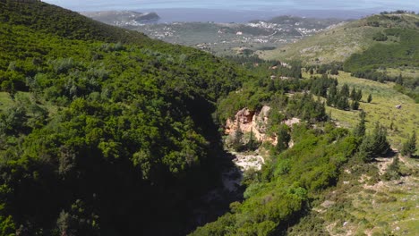 Erosion-canyon-in-mountain-forest-landscape-at-Llogara-National-Park,-Albanian-Ionian-Sea-Coast