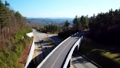 car-drives-over-blue-ridge-parkway-bridge-near-boone-and-blowing-rock-nc,-north-carolina