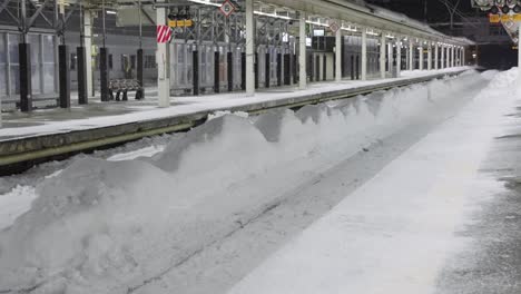 Snow-fall-covering-JR-Aomori-Train-Station-in-Northern-Japan,-Winter-Scene