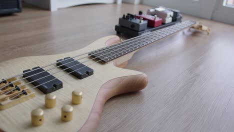 Close-Up-Dolly-of-a-Bass-Guitar-and-Effect-Pedals