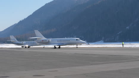Falcon-2000-private-jet-plane-at-Samedan-Airport,-Switzerland