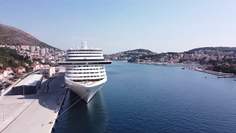 Exclusive-Cruise-Ship-at-the-Harbor-of-Dubrovnik,-Croatia---Aerial-View