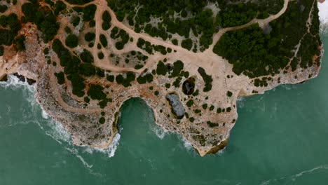 Top-down-drone-footage-from-the-Algarve-Coast-in-Portugal