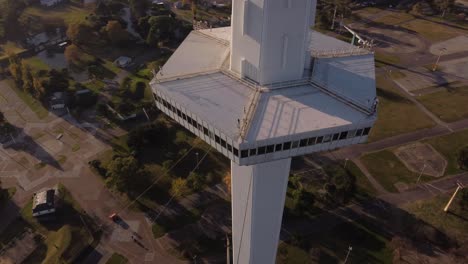 Aerial-birds-eye-shot-of-futuristic-Torre-Espacial-Tower-in-Buenos-Aires-during-sunset--High-angle-view