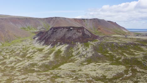 Aerial-view-showing-old-volcano-on-iceland-during-sunny-day-with-blue-sky