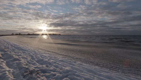 Sea-ice-melting-as-sun-sets-over-northern-coastline