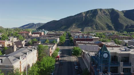 Low-flying-aerial-view-over-downtown-Durango,-Colorado