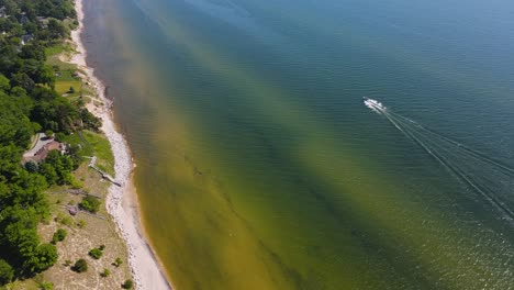 Drone-track-of-a-small-boatcraft-along-Lake-Michigan's-coast