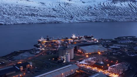 Boats-anchored-at-port-delivering-aluminium-metal-to-smelter-facility,-Iceland