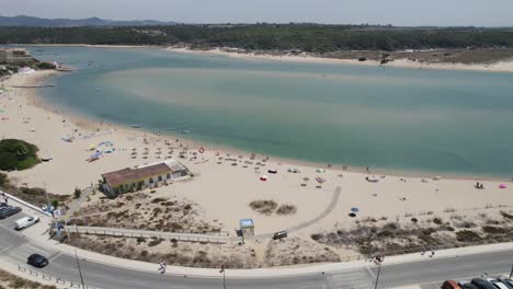 Idyllic-Praia-da-Franquia-on-bank-of-Mira-River-estuary,-Portugal