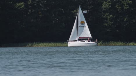 Scarpetta-Yacht-sailing-in-Wdzydze-Lake-in-Kaszubski-park-krajobrazowy-in-Pomeranian-Voivodeship