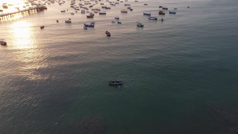 Drone-video-of-a-boat-rowing-in-ocean