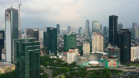 development-and-construction-of-skyscrapers-in-south-Jakarata-Indonesia-at-sunset,-aerial