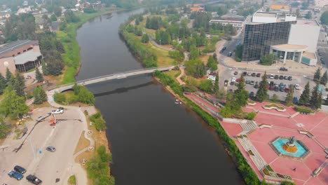 4K-Drone-Video-of-the-Chena-River-Viewpoint-Bridge-in-Downtown-Fairbanks,-Alaska-during-Summer-Day