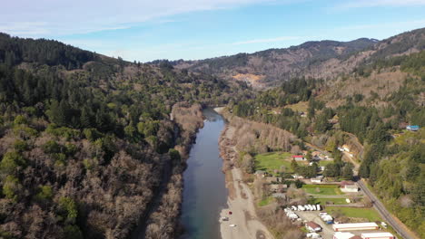 Chetco-River-near-Brookings,-Oregon.-Drone-flying-backwards