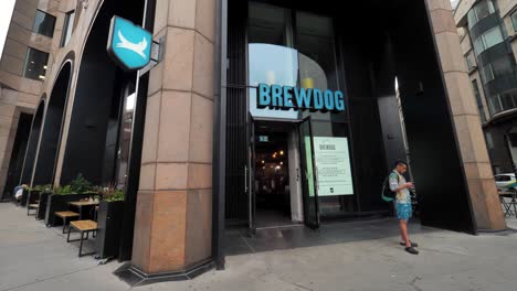 City-of-London-England-September-2022-Pan-up-establishing-shot-of-Brew-Dog-store