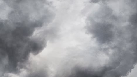 4K-dark-gray-cumulonimbus-cloud-in-the-sky,-a-point-of-view