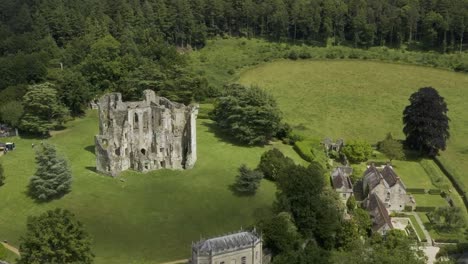 View-over-Old-Wardour-Castle-in-a-forest-setting-with-bright-green-sunny-fields