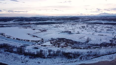 Flying-drone-footage-of-snowy-communities-landscapes