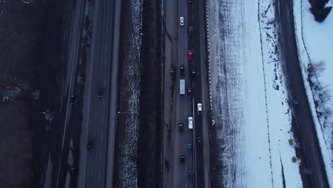 Revealing-aerial-view-of-canadian-snowy-mountains:-drone-footage-of-winter-roads