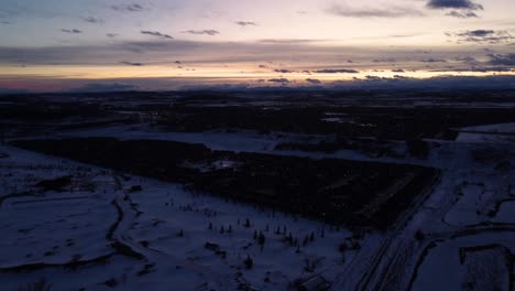 Late-Golden-Hour-drone-shot-of-community-in-winter-time